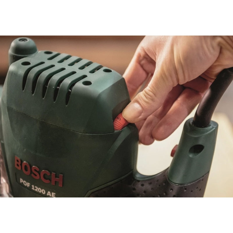 Freza electrica pentru lemn, Bosch POF, 1200 W, 28000 rpm, 55 mm, alimentare retea 230 V, 106 dB, 3.4 kg, include aparatoare transparenta si sistem de prindere accesorii, softgrip, design ergonomic